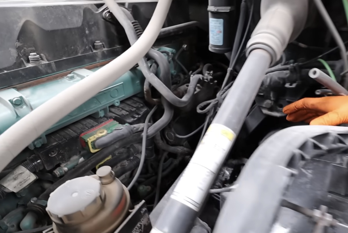 Mobile diesel mechanic repairing a commercial truck near Murray Utah